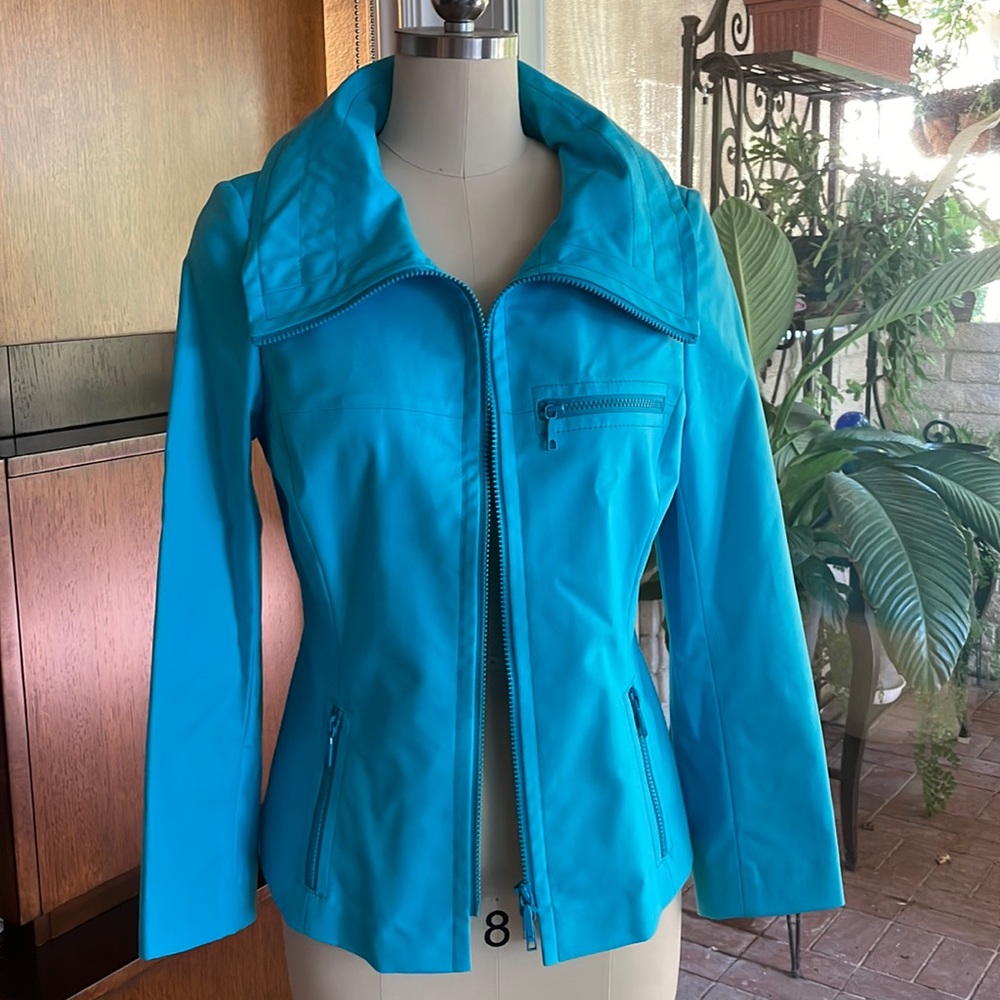 Lafayette turquoise jacket.